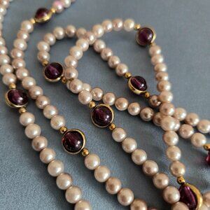 Vintage faux pearls and Amethyst glass necklace. Retro jewelry.